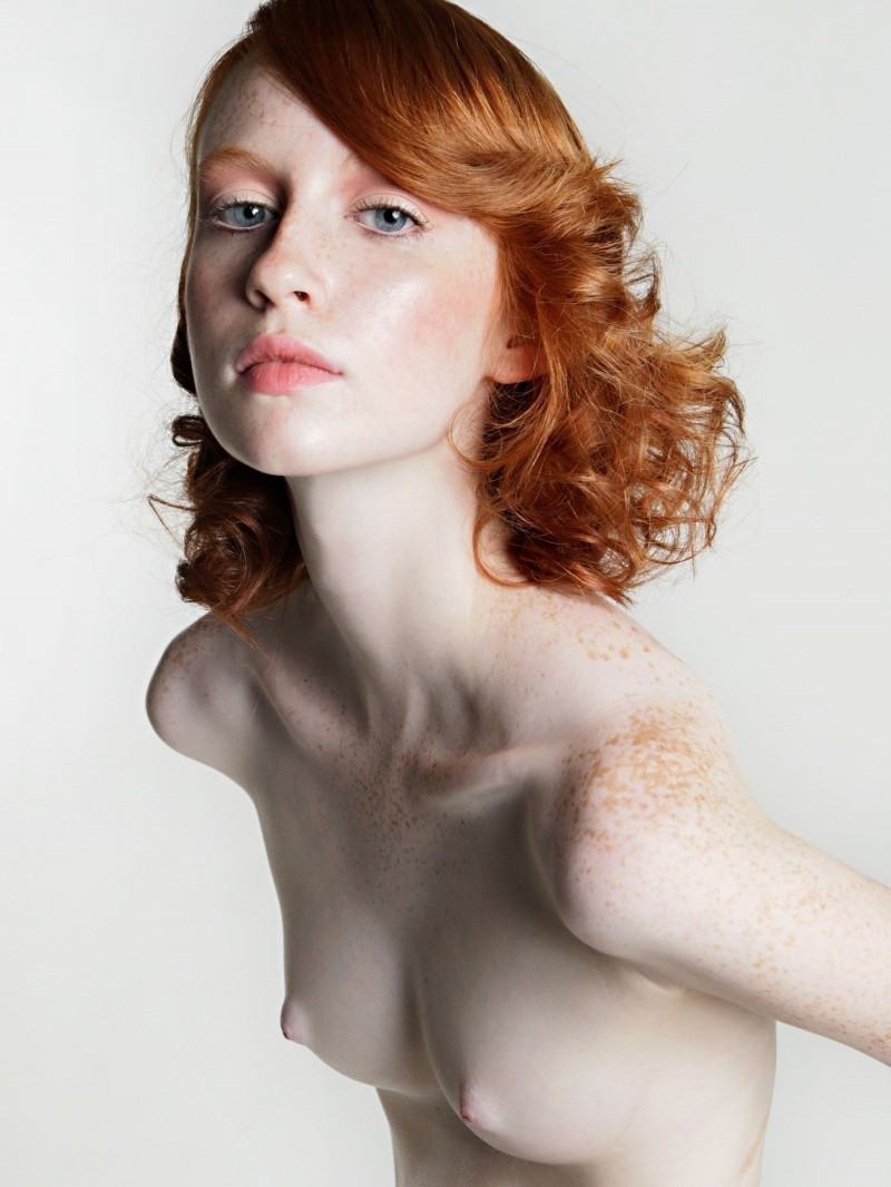 Skinny redhead nude rear