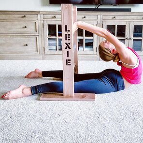 Petite dancer doing stretches