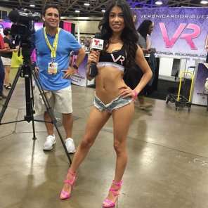 amateur photo Veronica Rodriguez doing a TV interview, wearing very short shorts