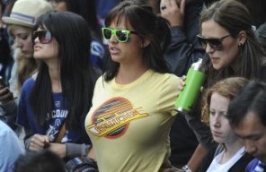 Fans at an outdoor rally in Vancouver to cheer on the Canucks during game five of the 2011 Stanley Cup