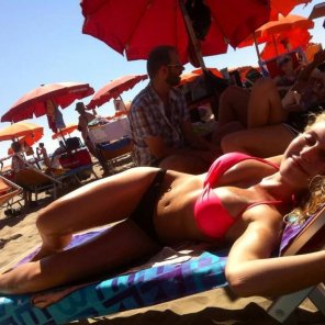 amateur photo Blonde on her back at the beach!