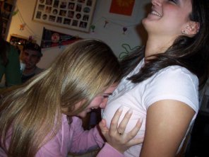 Feeling her friend's tits