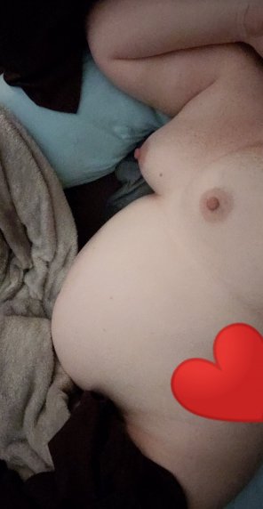amateur photo Who's coming to rub my back? 7 months pregnant.