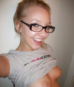 amateur photo Cute blonde in glasses.