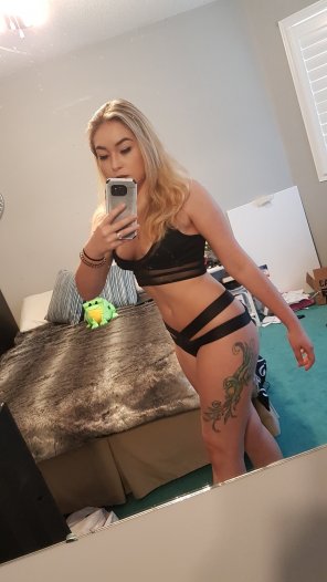 PictureBlonde hair, black bikini