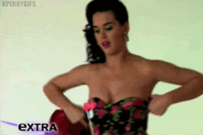Katy Perry awkwardly adjusting 