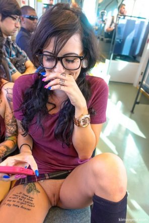 amateur photo Tattooed chick in the bus