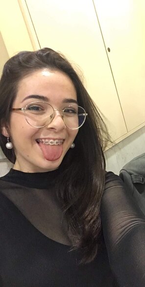 amateur photo Glasses cutie with braces for maximum pleasure