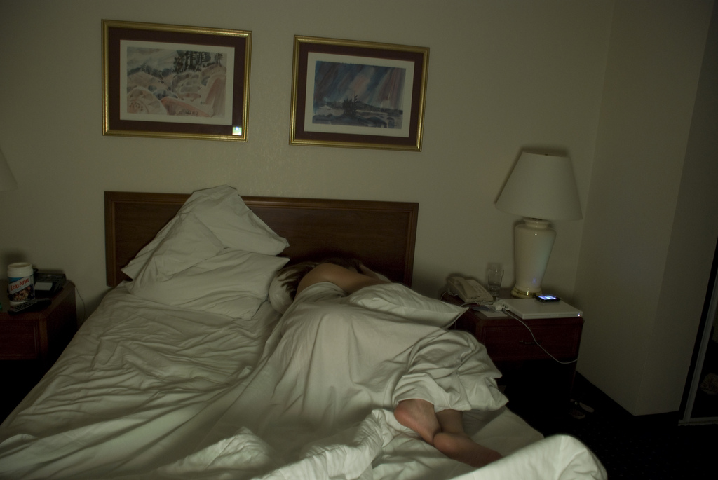 3735608-sleeping-in-the-hotel-room-2.webp