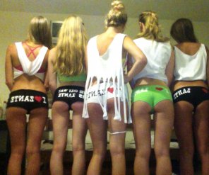 Girls showing off their asses in hotpants