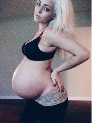 Stunning 9 month blonde pregnant