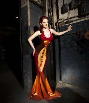 amateur photo Hot Redhead in a fancy latex dress