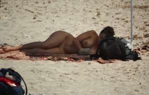 Reading on the beach.