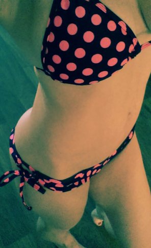 Itty bitty pink polka dot bikini