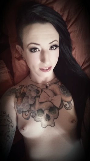 Pale and tattooed with pretty pierced nipples! Check out my latest selfie. . .