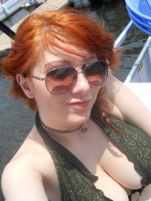 Busty redhead