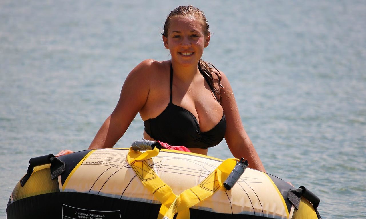 If she goes tubing in that bikini, her boobs are going to fly out of it. 
