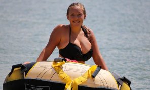 amateur pic If she goes tubing in that bikini, her boobs are going to fly out of it