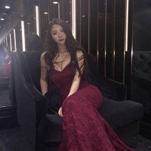 Asian goddess in a red dress