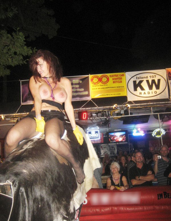 Naked Bull Riding