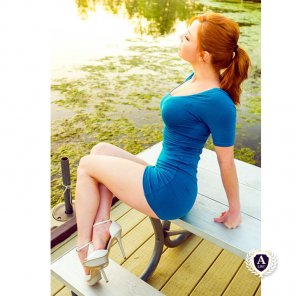 Redhead by the water