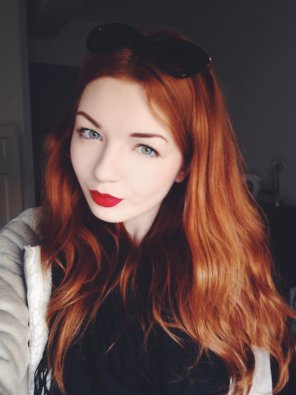 Pale, blue eyes and fiery hair