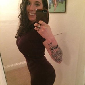Tattoo and tight dress selfie