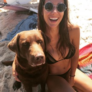 amateur photo With her dog on the beach