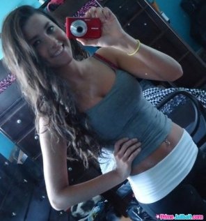amateur photo Selfie in a tank top and yoga pants
