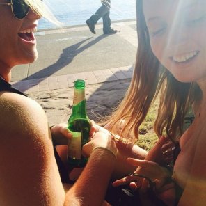 Happy girls by the beach