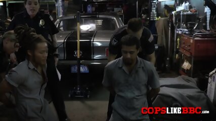Two Horny Police Officers Get To The Mechanic Just To Fuck Him Hard With His Massive Black Cock.