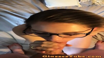 Petite Blonde Takes A Large Cumshot To Her Sexy Glasses