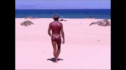 Tanned Guy On Beach In Tiny String Thong (temporarily!)