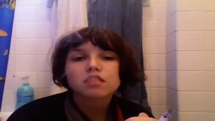 Short Haired Cutie Smoking Fetish VS 120s In Bathroom