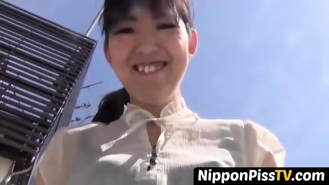 Perfect Oriental minx spilling pee on flight of stairs